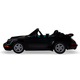 Black CRUZ Mini Monterey electric mini car, side profile.